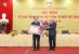 Ông Ngô Sách Thực - Chủ tịch Hội Cứu trợ TETT Việt Nam đón nhận Huân chương Lao động hạng Nhất trong Hội nghị Ủy Ban Trung ương Mặt trận Tổ Quốc Việt Nam lần thứ 9, khóa IX